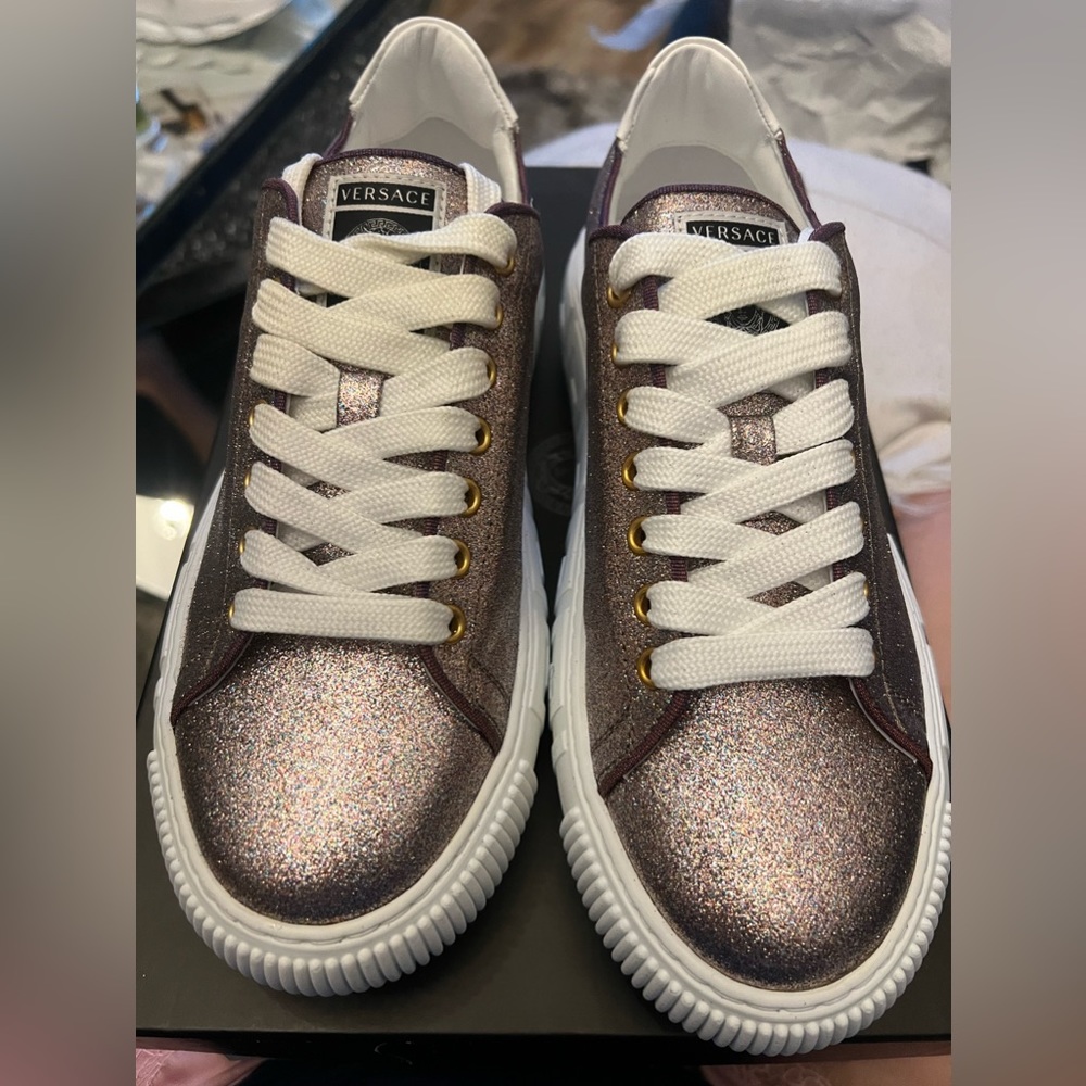 Women’s Versace greca sneakers.